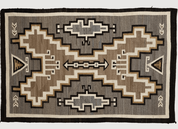 Navajo Blanket tapestry weave, natural dyes, with large geometric 'X' in the center, with arrows in the four corners. 1910 - 1930
